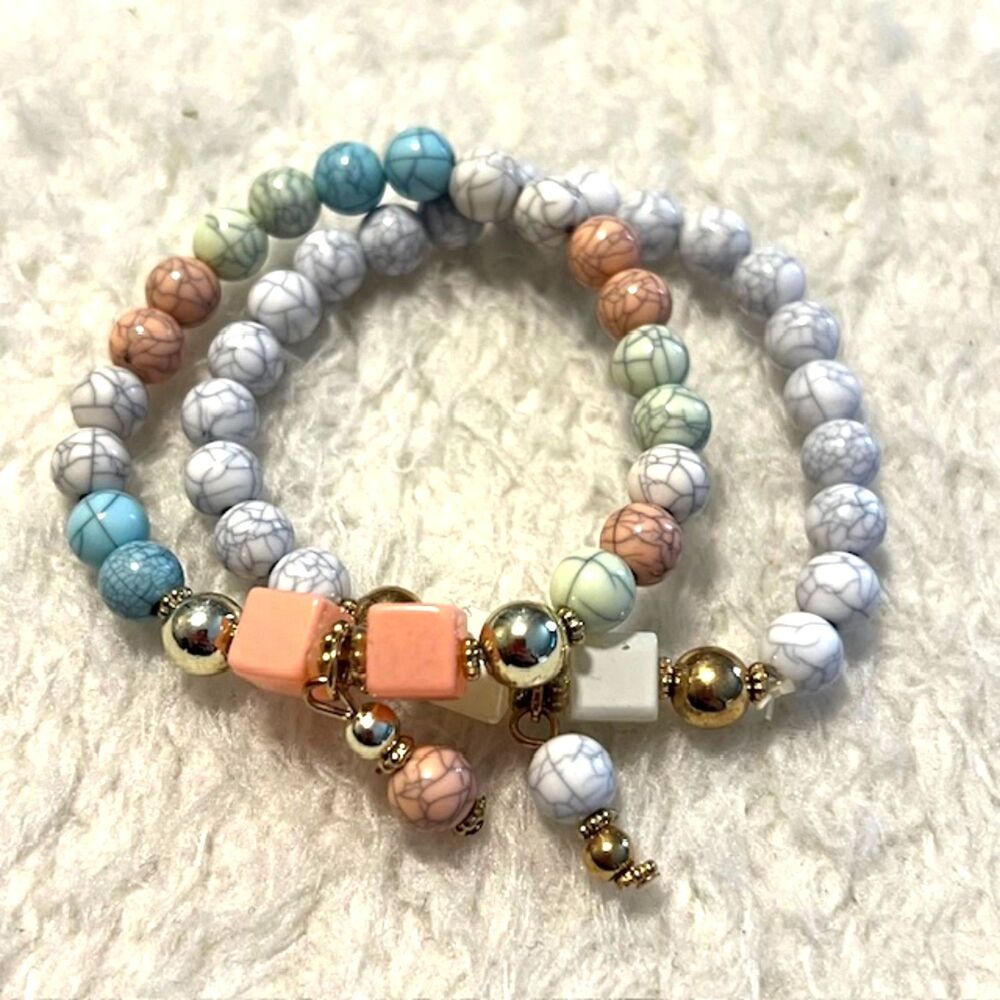 Lot of 2 White & Multicolored Pastel Beaded Gold Tone Charm Elastic Bracelets